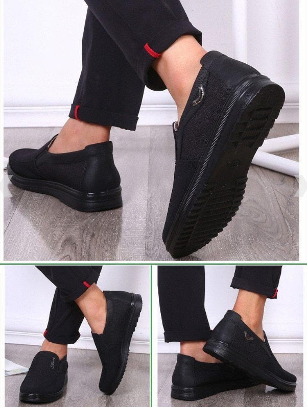 Business Casual Soft-soled Feet Shoes: black men's casual slip-on with breathable, lightweight polyurethane sole.
