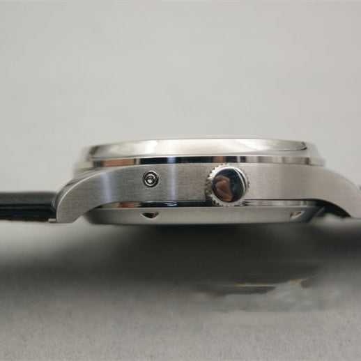 Parnis Automatic Watch with stainless steel case, black leather strap, and side crown detail.