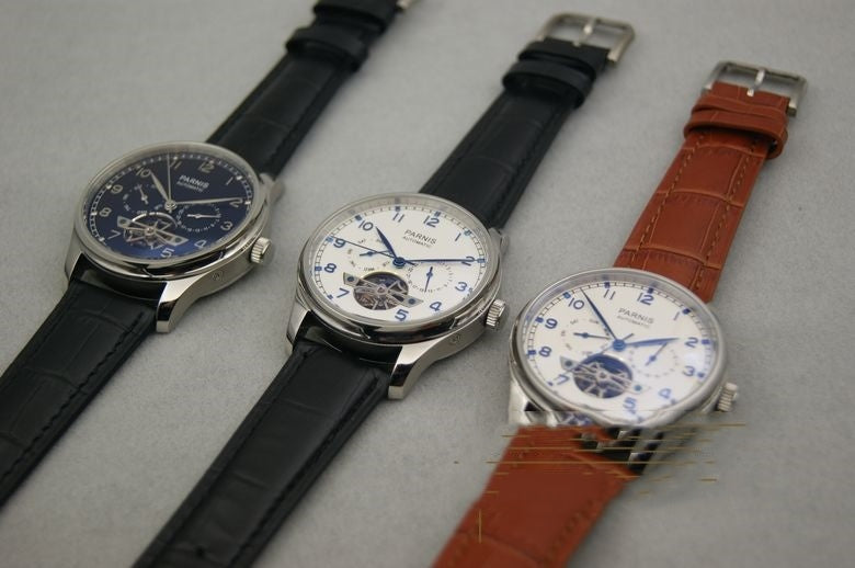 Parnis Automatic Watch trio: blue-skeleton dial on black strap; white dial with blue numerals on black and brown straps