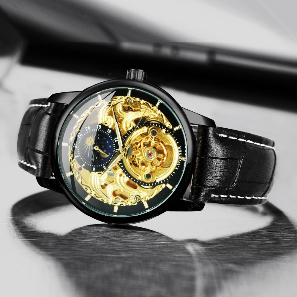 Elegant Carved Hollow Automatic Mechanical Watch features a gold shell and black strap, showcasing intricate craftsmanship.