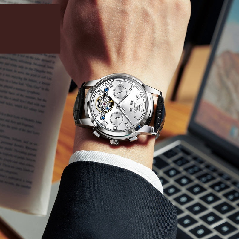 Stylish Olevs Waterproof Luminous Multifunctional Automatic Mechanical Watch showcased on wrist, ideal for any occasion.