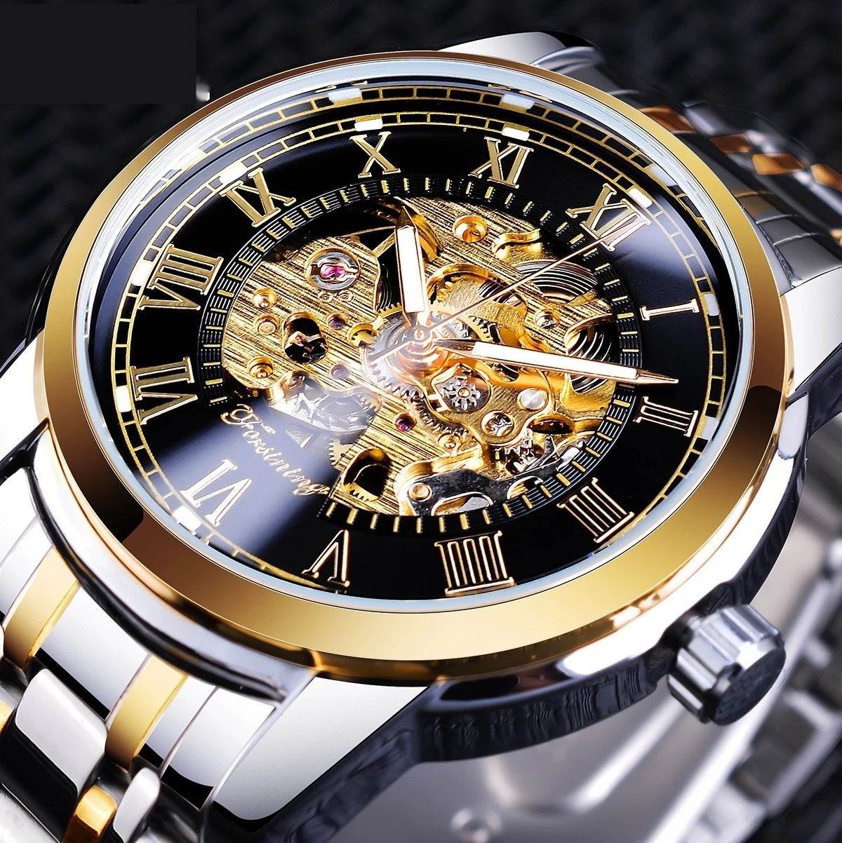 Elegant Forsining Manual Mechanical Manipulator Watch features a gold strap with a striking black surface design.
