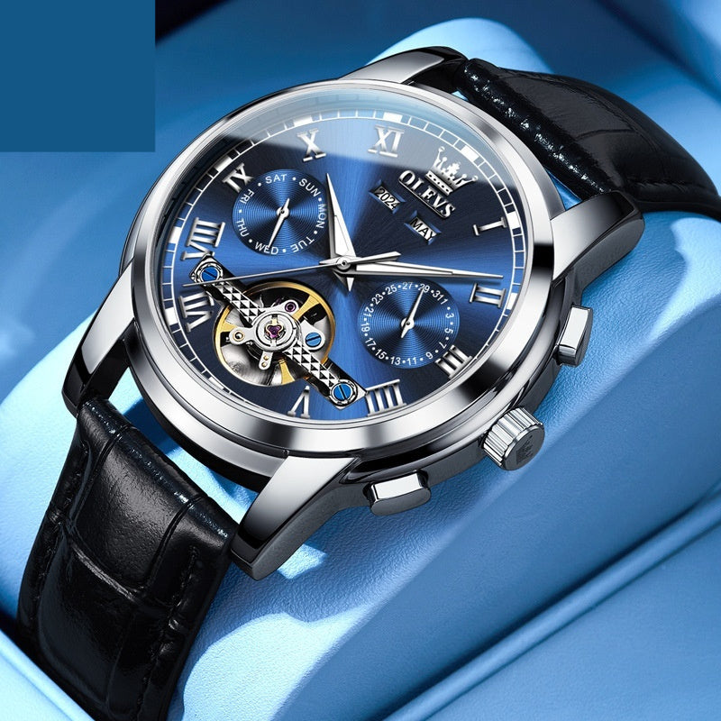 Olevs Waterproof Luminous Multifunctional Automatic Mechanical Watch showcases a stunning blue dial with black leather strap.
