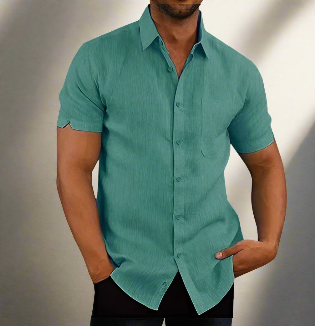 Stylish Short Sleeve Casual Loose Top Shirt in teal, perfect for a relaxed look. Available in multiple colors and sizes.