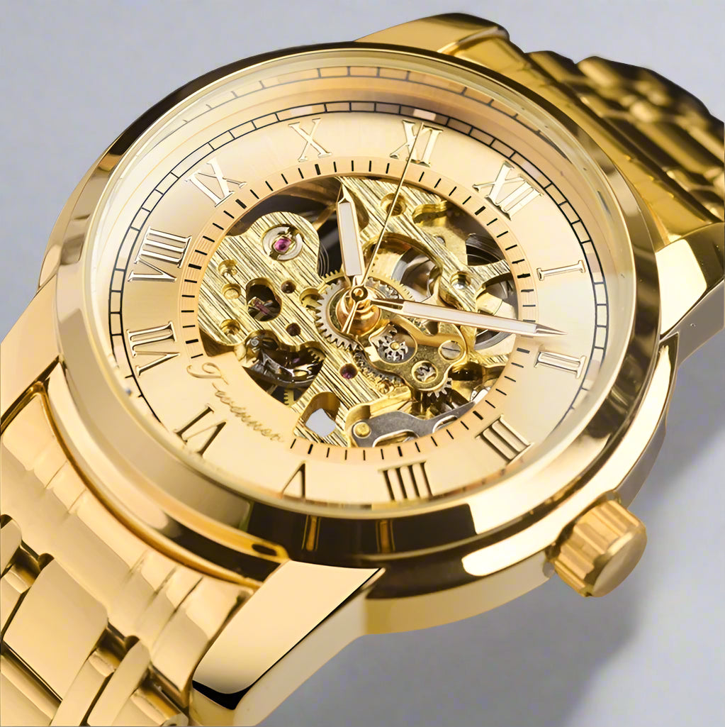 Forsining Manual Mechanical Manipulator Watch features a stylish gold strap and intricate skeleton design.