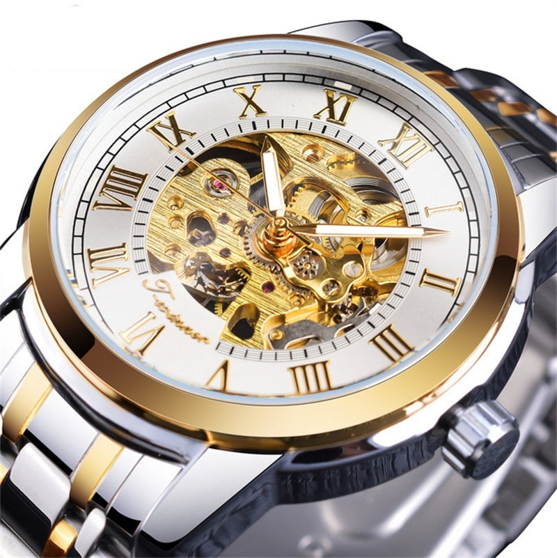 Elegant Forsining Manual Mechanical Manipulator Watch showcases a stunning gold and silver design with intricate details.