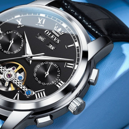 Discover the Olevs Waterproof Luminous Multifunctional Automatic Mechanical Watch with a stylish black leather strap.